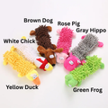Set of colorful dog chew toys with labels of animal names on a white background